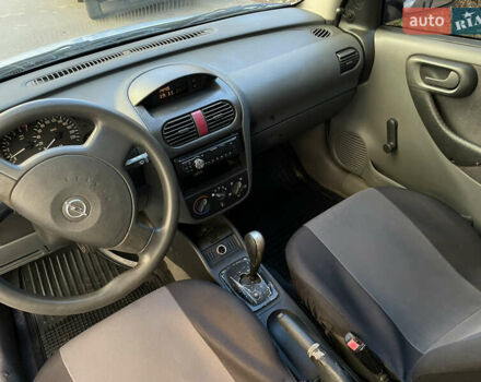 Серый Опель Корса, объемом двигателя 1.2 л и пробегом 220 тыс. км за 2350 $, фото 7 на Automoto.ua