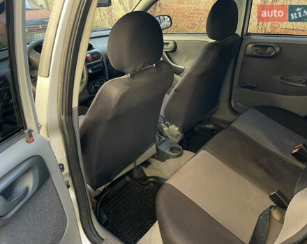 Серый Опель Корса, объемом двигателя 1.2 л и пробегом 220 тыс. км за 2350 $, фото 6 на Automoto.ua