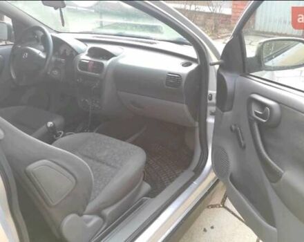 Серый Опель Корса, объемом двигателя 1.2 л и пробегом 274 тыс. км за 2895 $, фото 4 на Automoto.ua