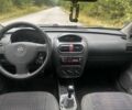 Сірий Опель Корса, об'ємом двигуна 1 л та пробігом 160 тис. км за 1999 $, фото 4 на Automoto.ua
