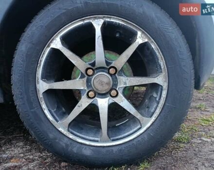 Сірий Опель Корса, об'ємом двигуна 1.2 л та пробігом 220 тис. км за 3300 $, фото 6 на Automoto.ua