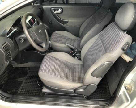 Серый Опель Корса, объемом двигателя 1.2 л и пробегом 170 тыс. км за 2600 $, фото 2 на Automoto.ua