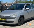 Серый Опель Корса, объемом двигателя 1 л и пробегом 174 тыс. км за 3200 $, фото 2 на Automoto.ua