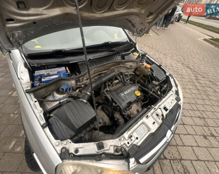 Серый Опель Корса, объемом двигателя 1 л и пробегом 238 тыс. км за 2800 $, фото 6 на Automoto.ua