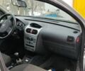 Серый Опель Корса, объемом двигателя 1 л и пробегом 100 тыс. км за 697 $, фото 1 на Automoto.ua