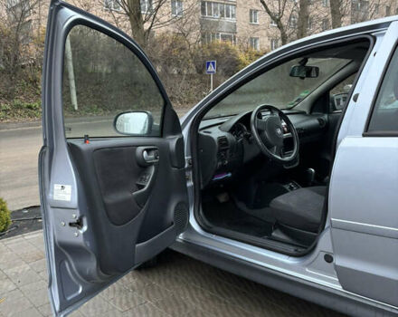 Серый Опель Корса, объемом двигателя 1 л и пробегом 137 тыс. км за 3600 $, фото 19 на Automoto.ua