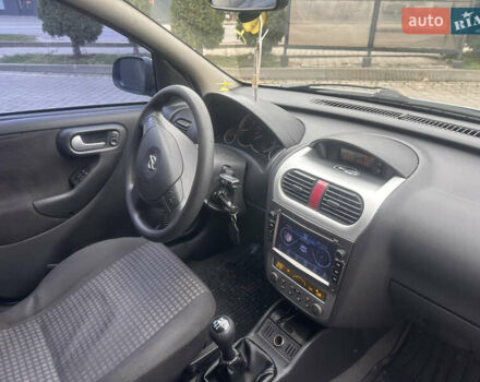 Серый Опель Корса, объемом двигателя 1 л и пробегом 238 тыс. км за 2800 $, фото 4 на Automoto.ua