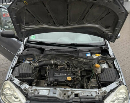 Серый Опель Корса, объемом двигателя 1 л и пробегом 137 тыс. км за 3600 $, фото 14 на Automoto.ua