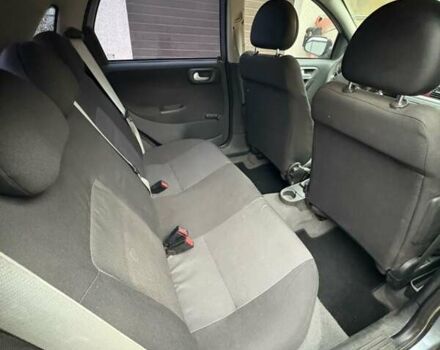 Серый Опель Корса, объемом двигателя 1 л и пробегом 216 тыс. км за 3800 $, фото 10 на Automoto.ua