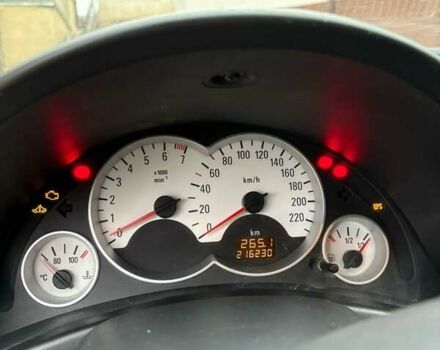 Серый Опель Корса, объемом двигателя 1 л и пробегом 216 тыс. км за 3800 $, фото 13 на Automoto.ua