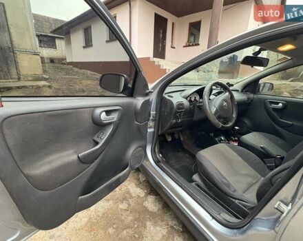 Серый Опель Корса, объемом двигателя 1 л и пробегом 216 тыс. км за 3800 $, фото 5 на Automoto.ua