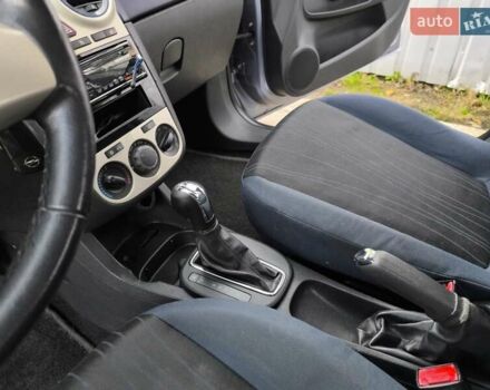 Серый Опель Корса, объемом двигателя 1.4 л и пробегом 211 тыс. км за 6750 $, фото 16 на Automoto.ua