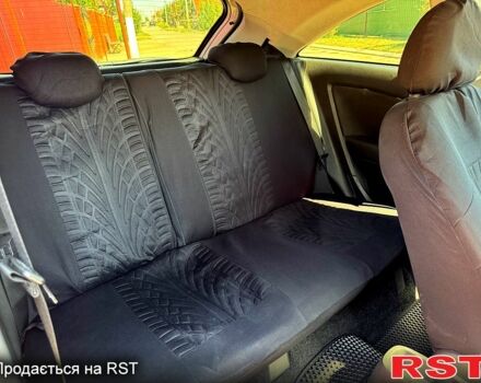 Серый Опель Корса, объемом двигателя 1.4 л и пробегом 207 тыс. км за 5700 $, фото 6 на Automoto.ua