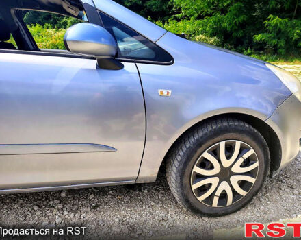 Серый Опель Корса, объемом двигателя 1.2 л и пробегом 241 тыс. км за 4300 $, фото 5 на Automoto.ua