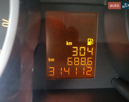 Серый Опель Корса, объемом двигателя 1.23 л и пробегом 314 тыс. км за 4900 $, фото 12 на Automoto.ua