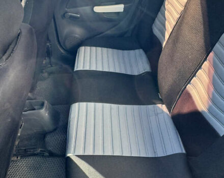 Серый Опель Корса, объемом двигателя 1.3 л и пробегом 331 тыс. км за 4800 $, фото 8 на Automoto.ua