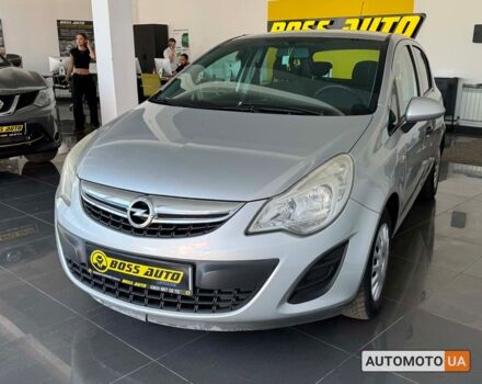 Серый Опель Корса, объемом двигателя 1 л и пробегом 180 тыс. км за 5600 $, фото 2 на Automoto.ua