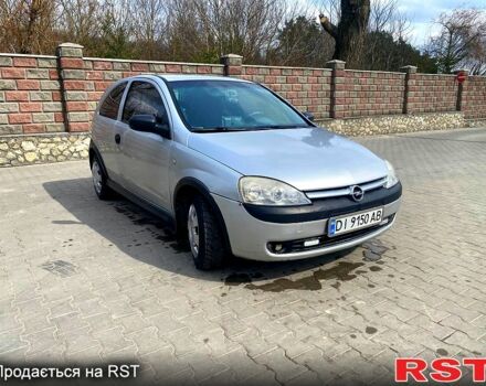 Серый Опель Корса, объемом двигателя 1 л и пробегом 290 тыс. км за 2400 $, фото 1 на Automoto.ua