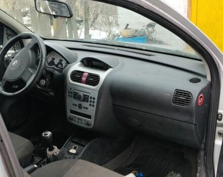 Серый Опель Корса, объемом двигателя 1 л и пробегом 100 тыс. км за 697 $, фото 1 на Automoto.ua