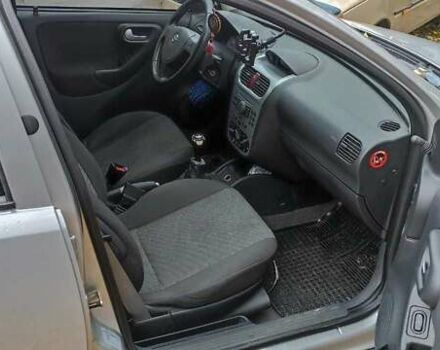 Серый Опель Корса, объемом двигателя 1 л и пробегом 235 тыс. км за 2787 $, фото 1 на Automoto.ua