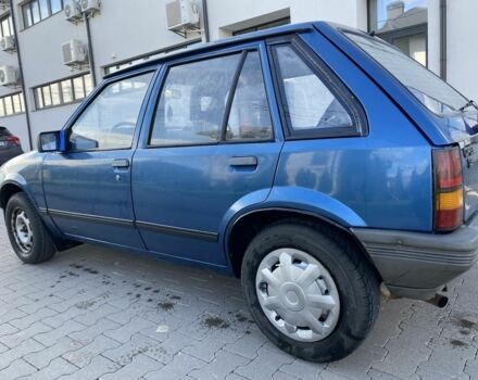 Синий Опель Корса, объемом двигателя 1.3 л и пробегом 51 тыс. км за 1300 $, фото 5 на Automoto.ua