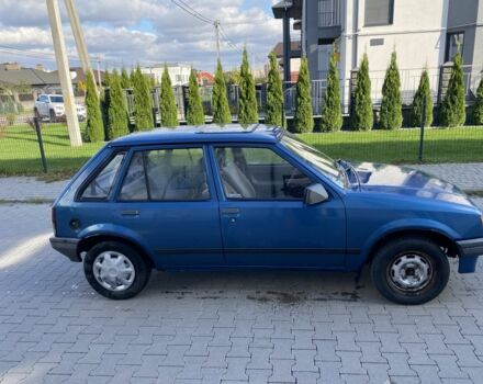 Синий Опель Корса, объемом двигателя 1.3 л и пробегом 51 тыс. км за 1300 $, фото 2 на Automoto.ua