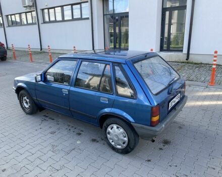 Синий Опель Корса, объемом двигателя 1.3 л и пробегом 51 тыс. км за 1300 $, фото 4 на Automoto.ua