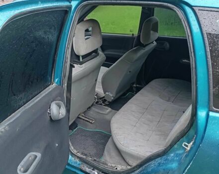 Синій Опель Корса, об'ємом двигуна 1.2 л та пробігом 248 тис. км за 1500 $, фото 7 на Automoto.ua