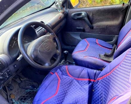 Синій Опель Корса, об'ємом двигуна 1.4 л та пробігом 0 тис. км за 500 $, фото 3 на Automoto.ua