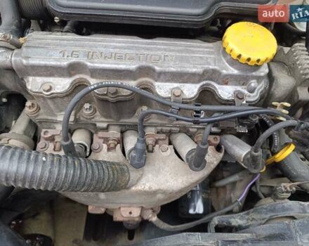 Синий Опель Корса, объемом двигателя 1.2 л и пробегом 200 тыс. км за 1800 $, фото 14 на Automoto.ua