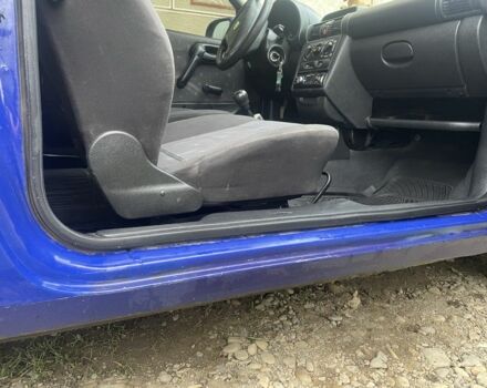 Синий Опель Корса, объемом двигателя 1.2 л и пробегом 190 тыс. км за 1700 $, фото 15 на Automoto.ua