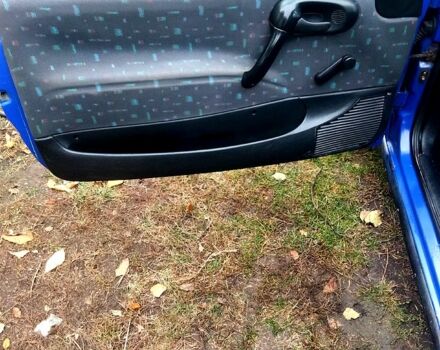 Синій Опель Корса, об'ємом двигуна 1.4 л та пробігом 270 тис. км за 999 $, фото 12 на Automoto.ua