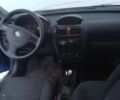 Синий Опель Корса, объемом двигателя 1.2 л и пробегом 242 тыс. км за 2500 $, фото 4 на Automoto.ua