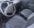 Синий Опель Корса, объемом двигателя 1 л и пробегом 267 тыс. км за 2608 $, фото 4 на Automoto.ua