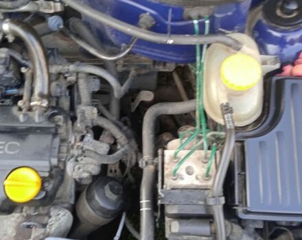 Синий Опель Корса, объемом двигателя 1.2 л и пробегом 281 тыс. км за 3000 $, фото 4 на Automoto.ua