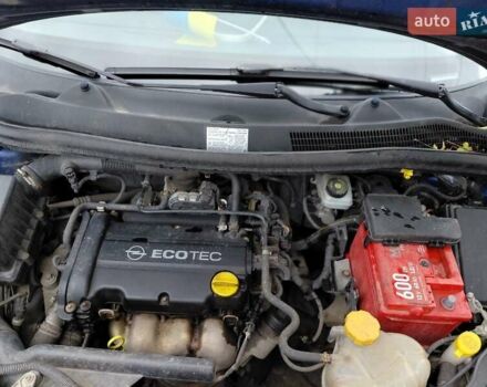 Синій Опель Корса, об'ємом двигуна 1.23 л та пробігом 218 тис. км за 3500 $, фото 4 на Automoto.ua