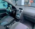 Синий Опель Корса, объемом двигателя 1.3 л и пробегом 240 тыс. км за 4950 $, фото 4 на Automoto.ua