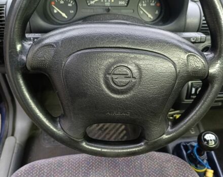 Синій Опель Корса, об'ємом двигуна 1.2 л та пробігом 200 тис. км за 1750 $, фото 8 на Automoto.ua