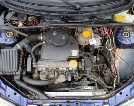 Синій Опель Корса, об'ємом двигуна 1.2 л та пробігом 200 тис. км за 1750 $, фото 11 на Automoto.ua