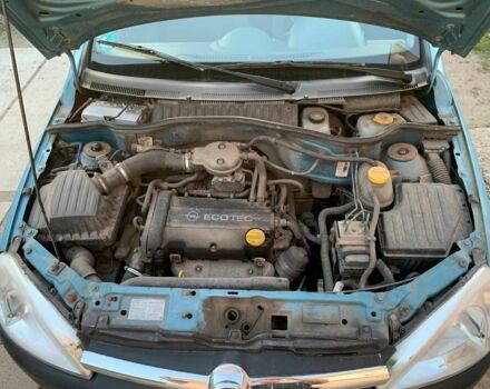 Синий Опель Корса, объемом двигателя 1.2 л и пробегом 200 тыс. км за 1300 $, фото 5 на Automoto.ua