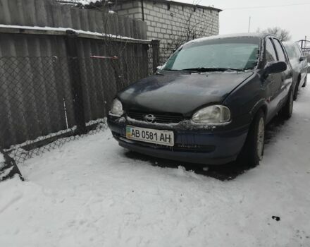 Синий Опель Корса, объемом двигателя 1 л и пробегом 245 тыс. км за 1600 $, фото 1 на Automoto.ua