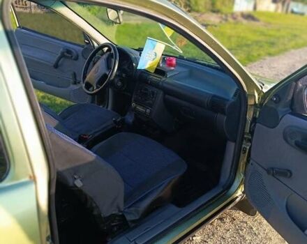 Зеленый Опель Корса, объемом двигателя 1.2 л и пробегом 300 тыс. км за 1900 $, фото 3 на Automoto.ua