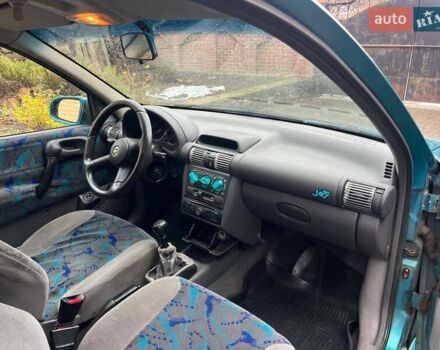 Зеленый Опель Корса, объемом двигателя 1.2 л и пробегом 315 тыс. км за 1450 $, фото 6 на Automoto.ua