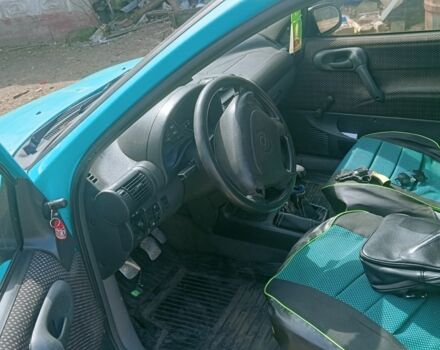 Зелений Опель Корса, об'ємом двигуна 1.2 л та пробігом 300 тис. км за 831 $, фото 3 на Automoto.ua