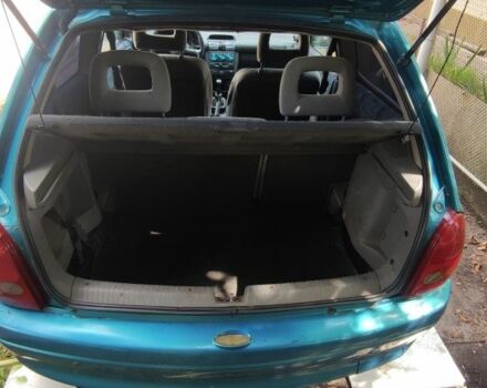 Зеленый Опель Корса, объемом двигателя 1.4 л и пробегом 314 тыс. км за 1300 $, фото 5 на Automoto.ua