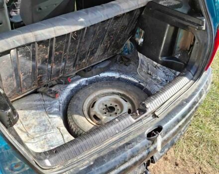 Зеленый Опель Корса, объемом двигателя 1.2 л и пробегом 248 тыс. км за 1400 $, фото 1 на Automoto.ua