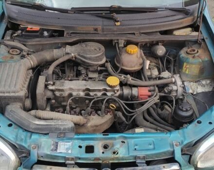 Зеленый Опель Корса, объемом двигателя 1.4 л и пробегом 314 тыс. км за 1300 $, фото 4 на Automoto.ua