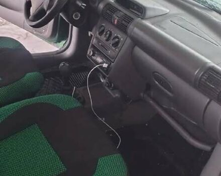 Зеленый Опель Корса, объемом двигателя 1.39 л и пробегом 330 тыс. км за 1800 $, фото 6 на Automoto.ua