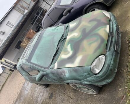 Зеленый Опель Корса, объемом двигателя 0 л и пробегом 100 тыс. км за 399 $, фото 2 на Automoto.ua