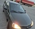Зеленый Опель Корса, объемом двигателя 1 л и пробегом 210 тыс. км за 2500 $, фото 1 на Automoto.ua